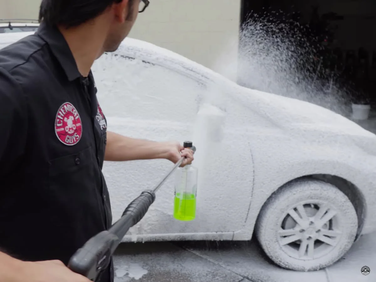 sprayingfoamontocarwithfoamcannon Exterior Pressure Foam Wash - Image 1